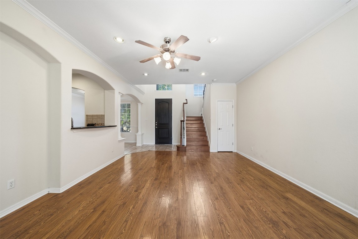 14100 Avery Ranch Boulevard, Unit 1502 Austin, TX 78717 - Photo 14 of 39 a view of an empty room with wooden floor