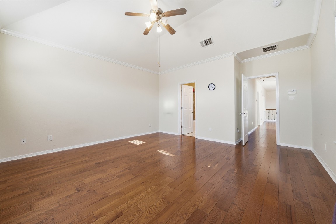 14100 Avery Ranch Boulevard, Unit 1502 Austin, TX 78717 - Photo 20 of 39 a view of a room with wooden floor and white walls