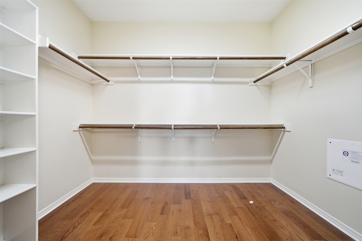 14100 Avery Ranch Boulevard, Unit 1502 Austin, TX 78717 - Photo 32 of 39 Spacious closet featuring dark wood-type flooring