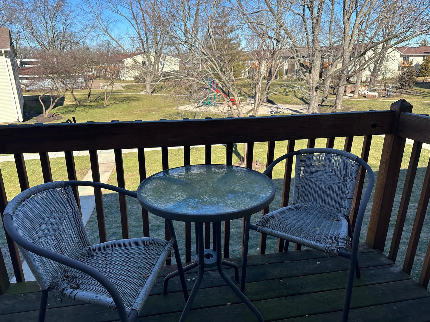 2100 Light Road, Unit 203 Oswego, IL 60543 - Photo 13 of 13 a view of a chairs and table on the roof deck