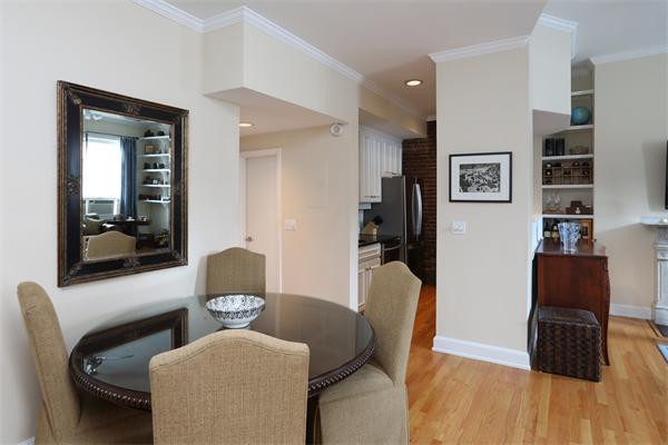 271 Beacon Street, Unit 6 Boston, MA 02116 - Photo 3 of 7 a dining room with furniture and window