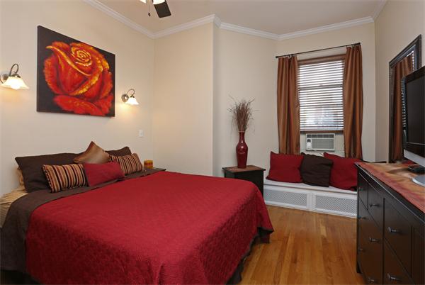 271 Beacon Street, Unit 6 Boston, MA 02116 - Photo 5 of 7 a bedroom with bed and a window
