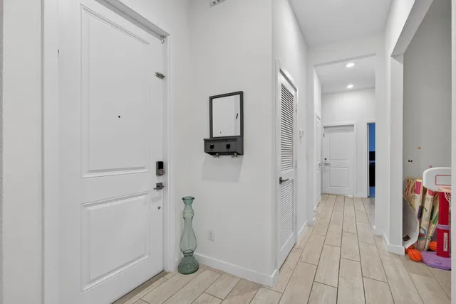 a open kitchen with stainless steel appliances kitchen island granite countertop a sink and cabinets