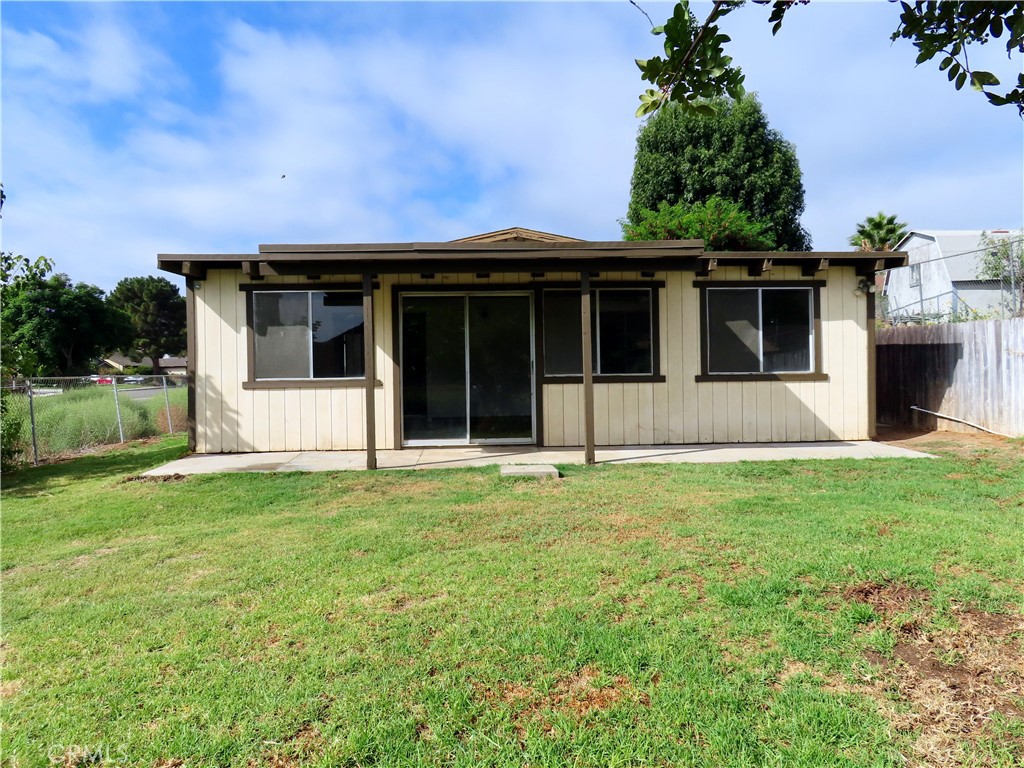 6149 La Sierra Avenue Riverside, CA 92505 - Photo 31 of 37 front view of a house with a yard