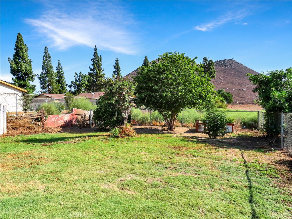 6149 La Sierra Avenue Riverside, CA 92505 - Photo 35 of 37 a backyard of a house with table and chairs