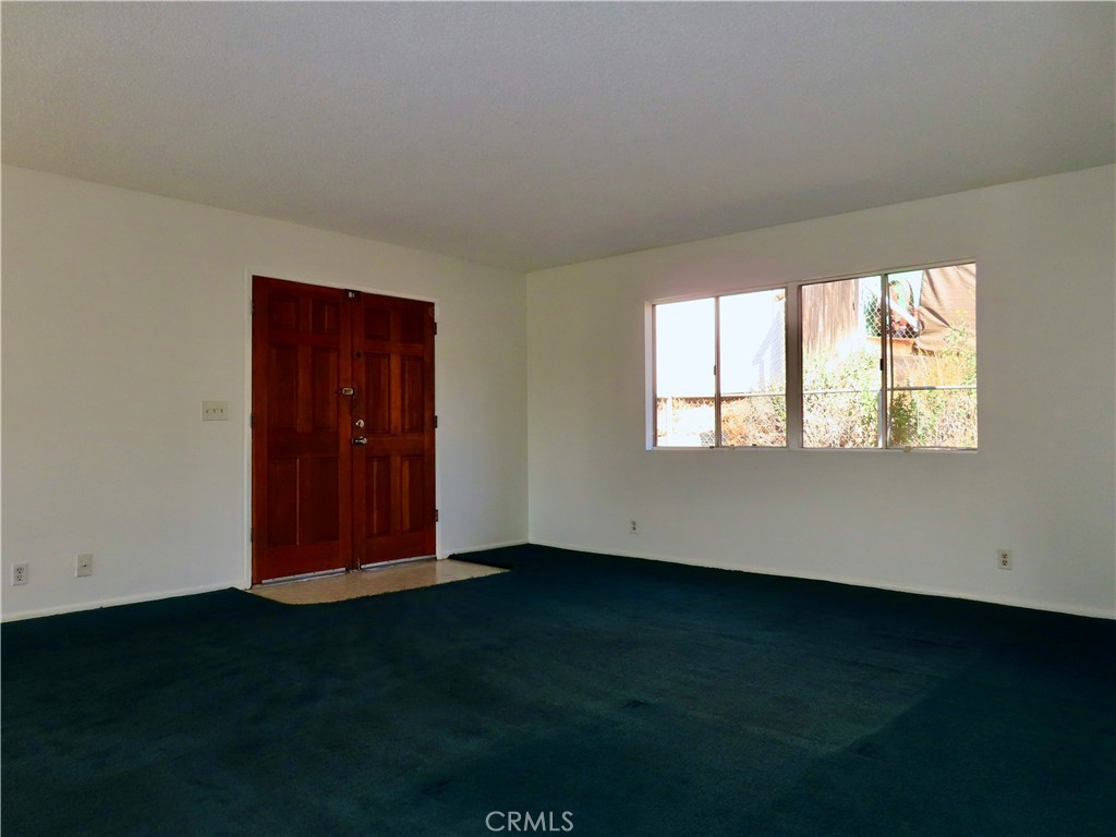 6149 La Sierra Avenue Riverside, CA 92505 - Photo 9 of 37 an empty room with windows