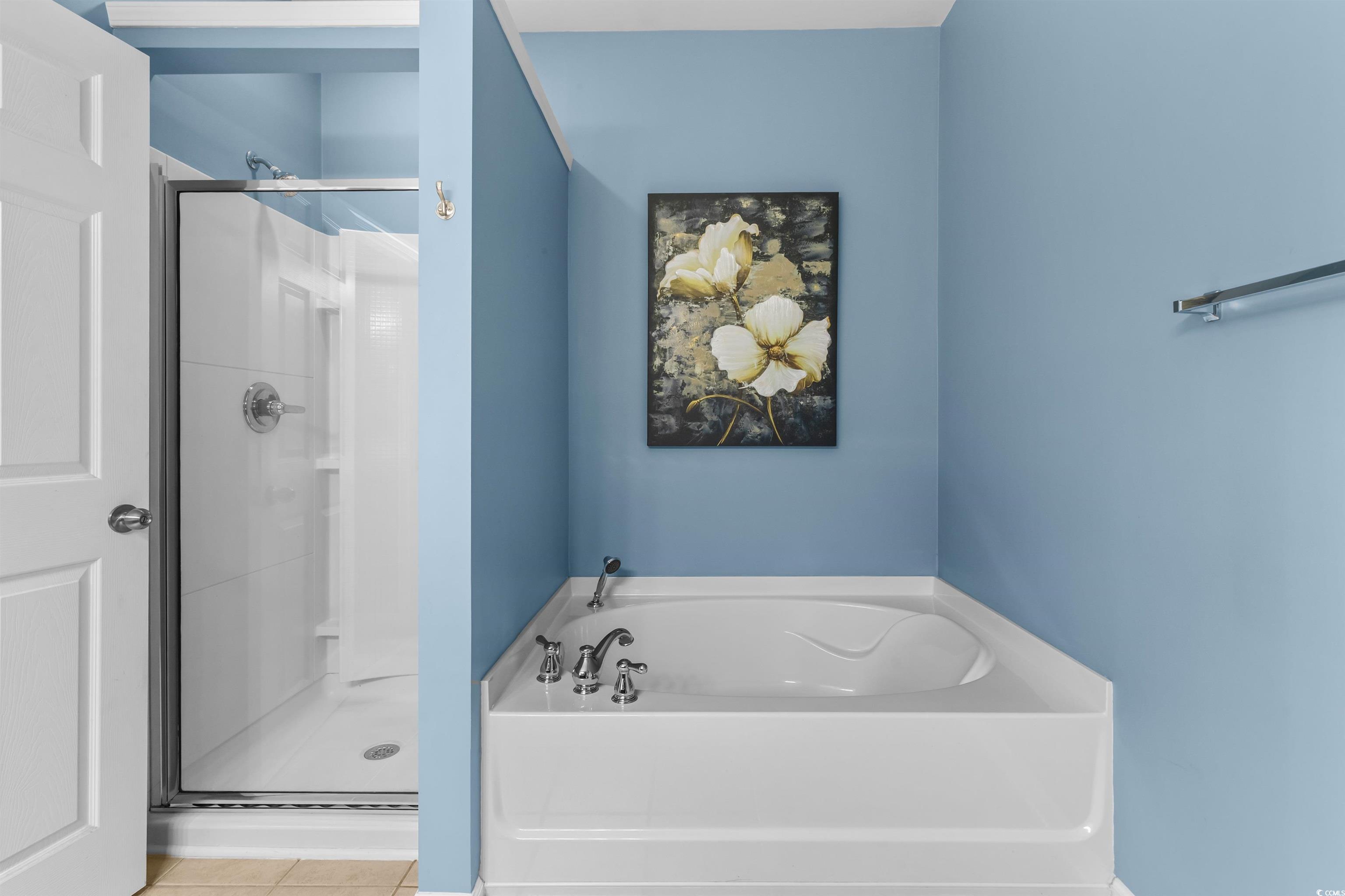 3233 Volterra Way, Unit 3233 Myrtle Beach, SC 29579 - Photo 22 of 40 Full bath with a shower stall, a bath, and tile patterned floors