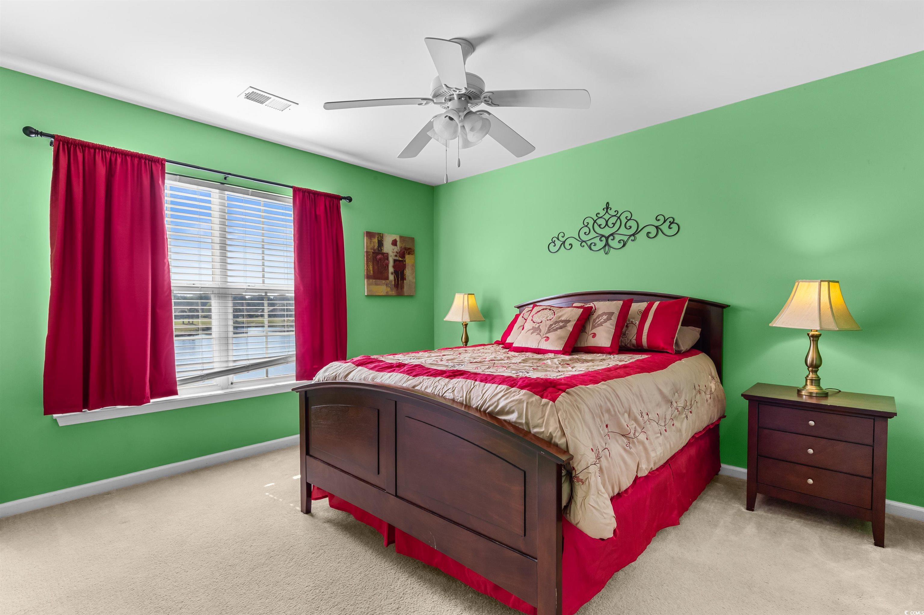 3233 Volterra Way, Unit 3233 Myrtle Beach, SC 29579 - Photo 30 of 40 Bedroom featuring carpet flooring and a ceiling fan