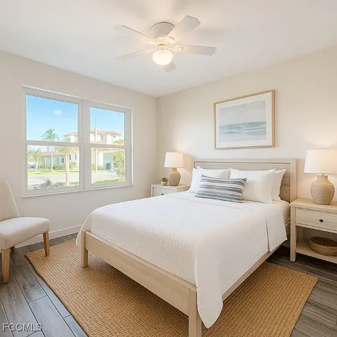 a bedroom with bed and a window