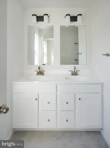 a view of a dining room with furniture and window
