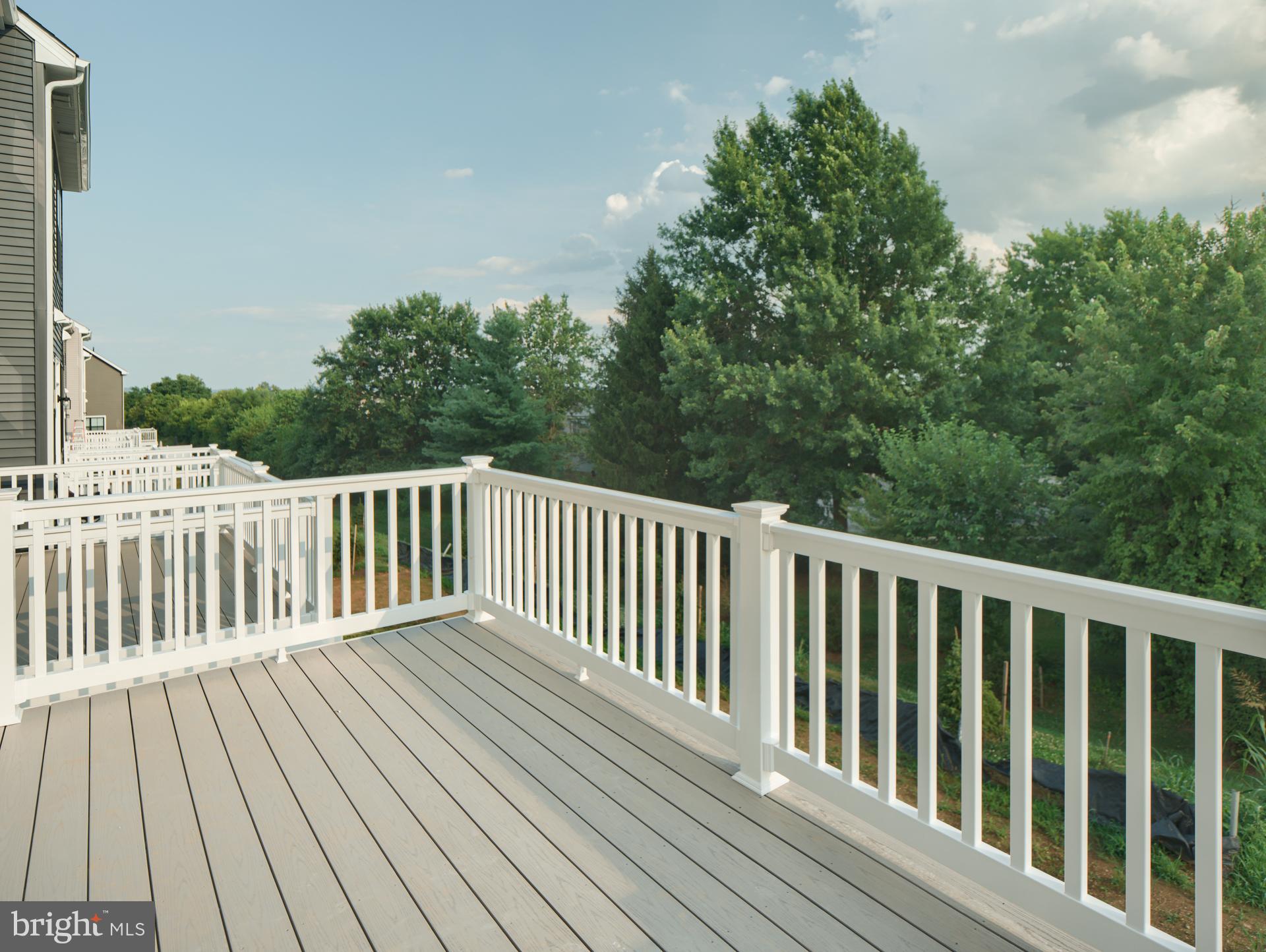 2603 Front Shed Drive Frederick, MD 21702 - Photo 7 of 77 a balcony with wooden floor and fence