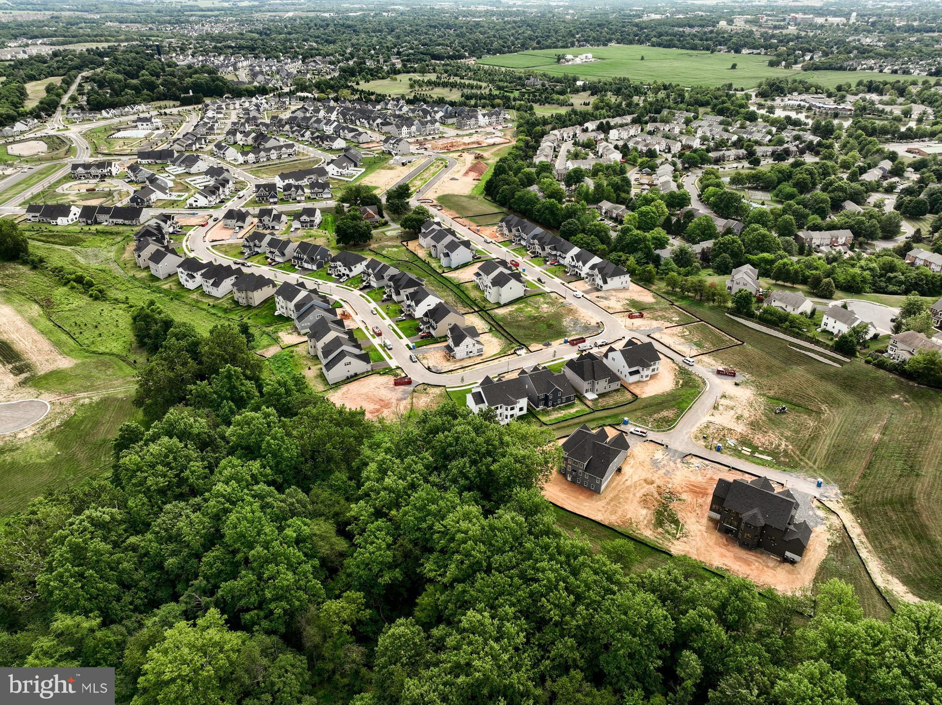 2603 Front Shed Drive Frederick, MD 21702 - Photo 75 of 77 an aerial view of residential houses with outdoor space and trees