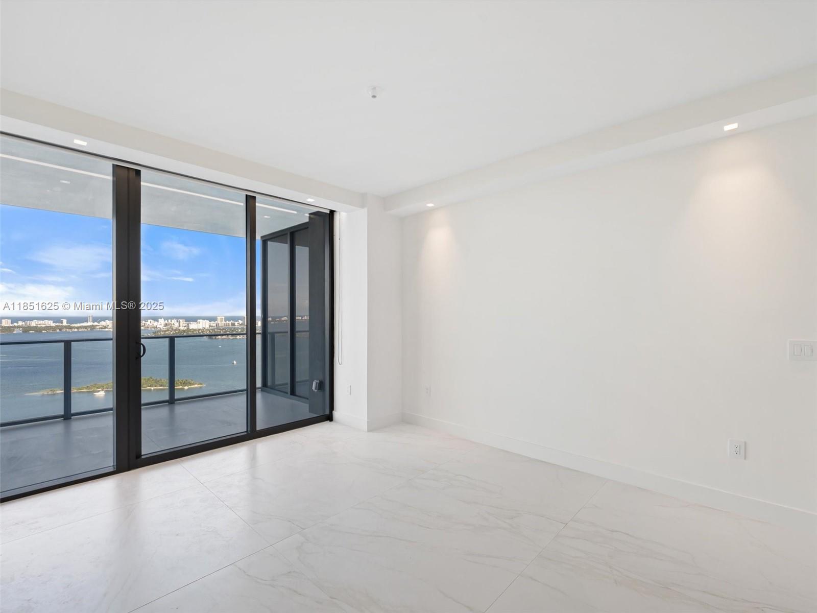 700 Northeast 24th Street, Unit 4305 Miami, FL 33137 - Photo 11 of 54 a view of an empty room with a window