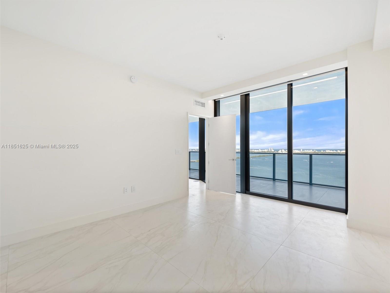 700 Northeast 24th Street, Unit 4305 Miami, FL 33137 - Photo 12 of 54 a view of an empty room with a window