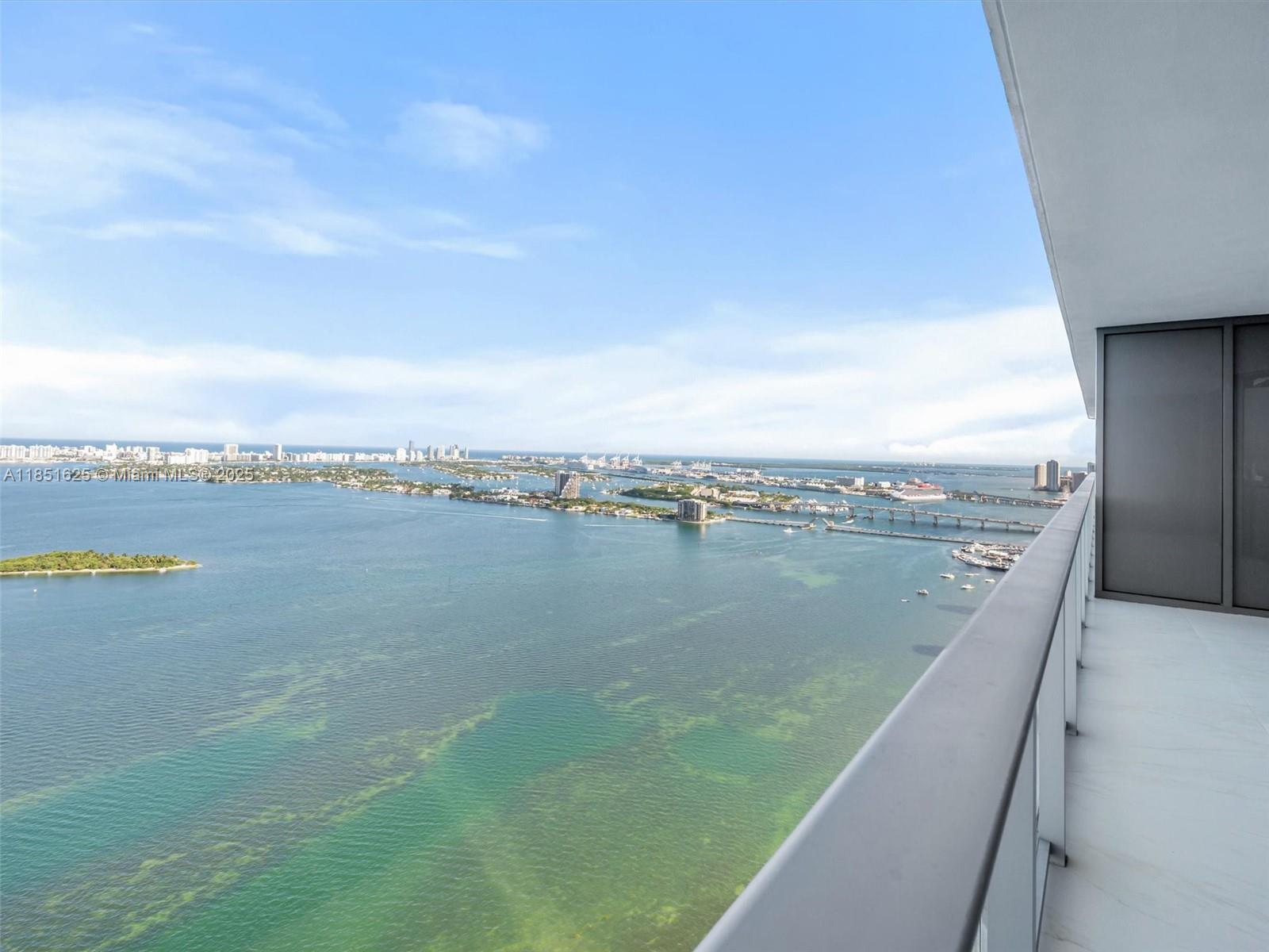 700 Northeast 24th Street, Unit 4305 Miami, FL 33137 - Photo 4 of 54 a view of a lake with a big yard