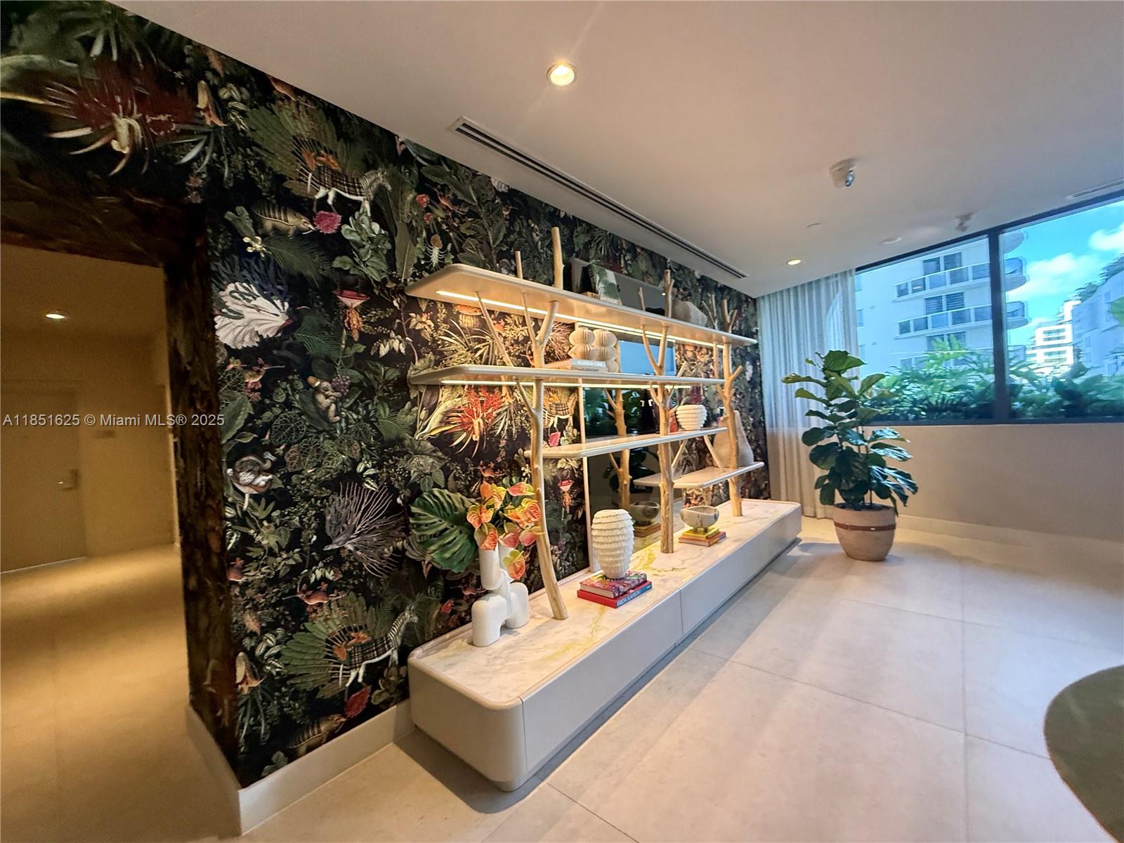 700 Northeast 24th Street, Unit 4305 Miami, FL 33137 - Photo 48 of 54 a very nice looking room with a large window and potted plants