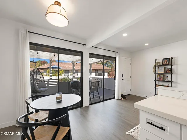 a room with furniture and wooden floor