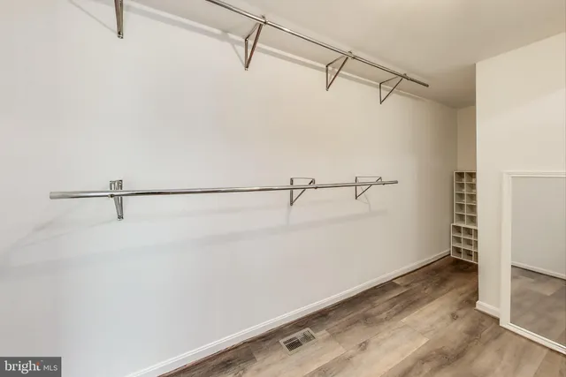 a view of a room with racks on the wall