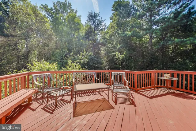 a view of balcony with furniture