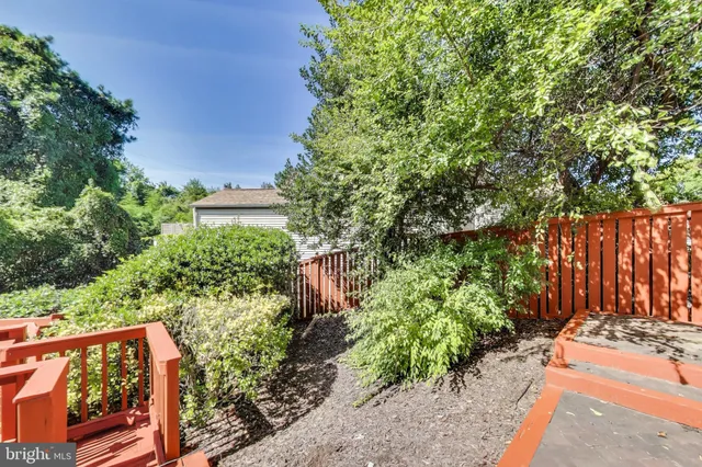 a picture of a bench in a white wall