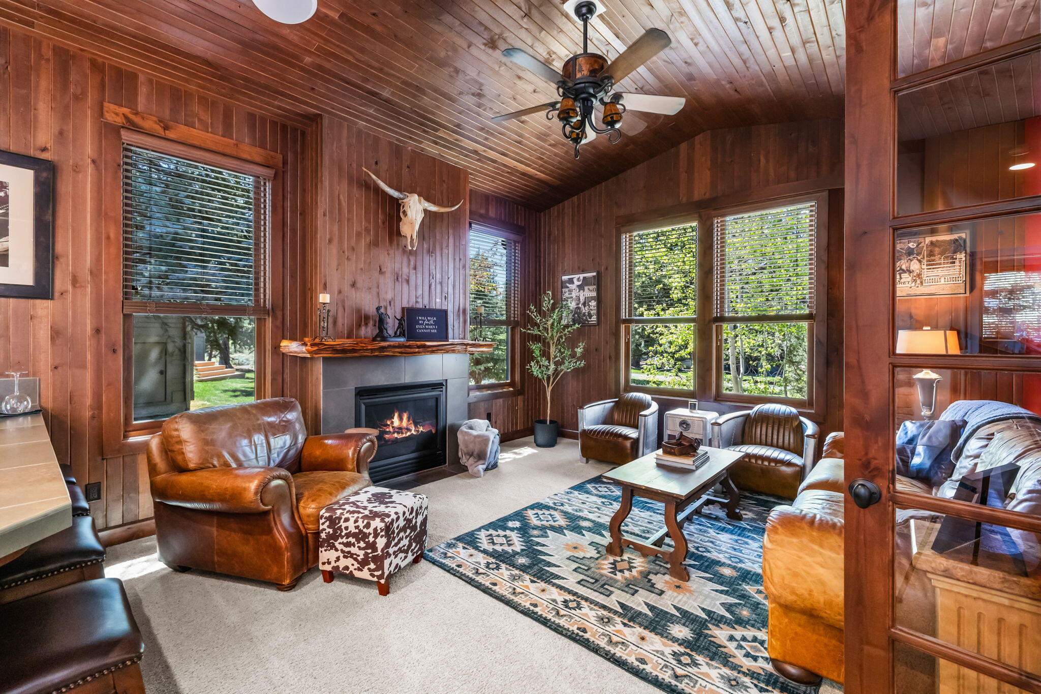1144 Highland View Loop Redmond, OR 97756 - Photo 15 of 69 a living room with furniture fireplace and large windows