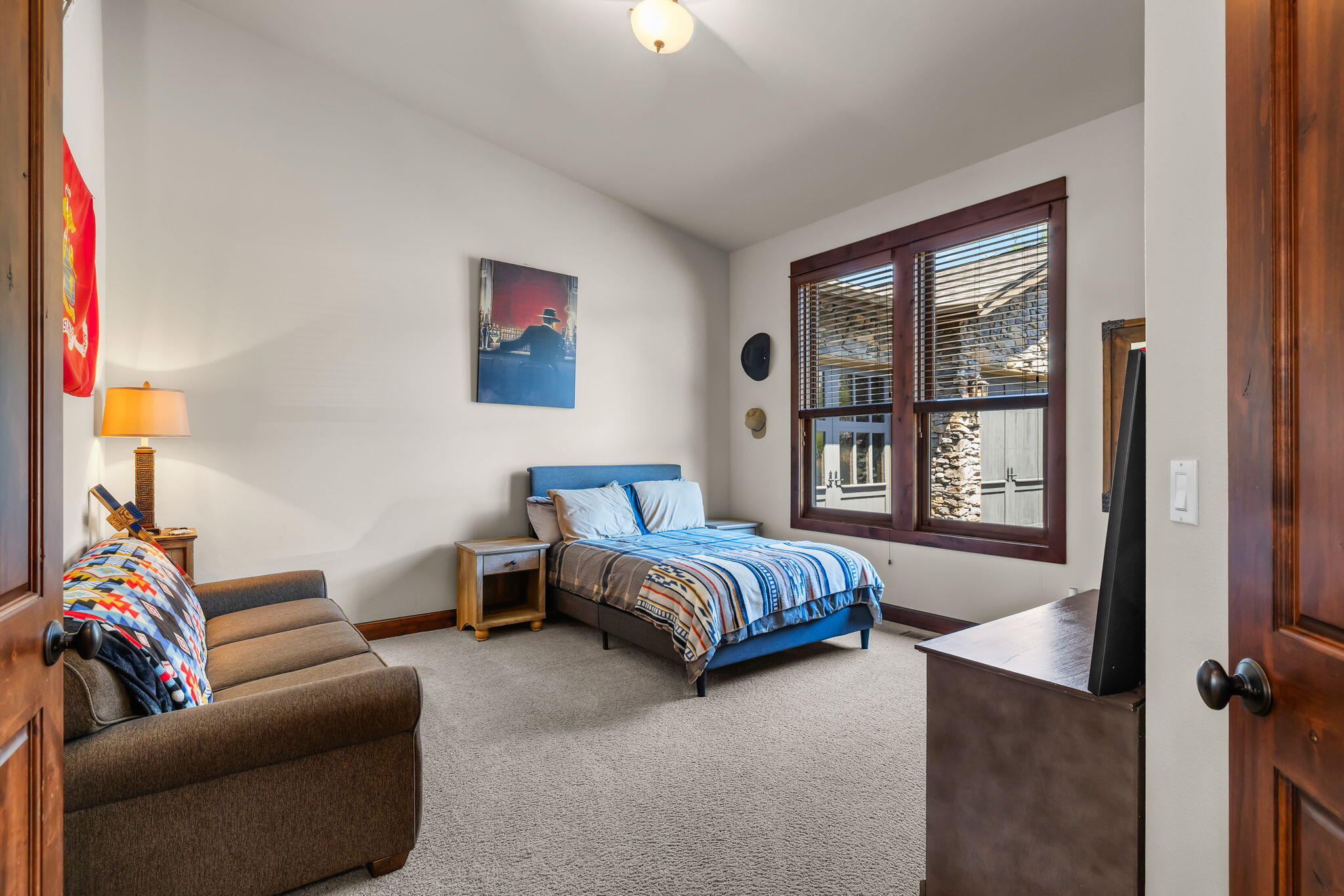 1144 Highland View Loop Redmond, OR 97756 - Photo 20 of 69 a bedroom with a bed couch and window