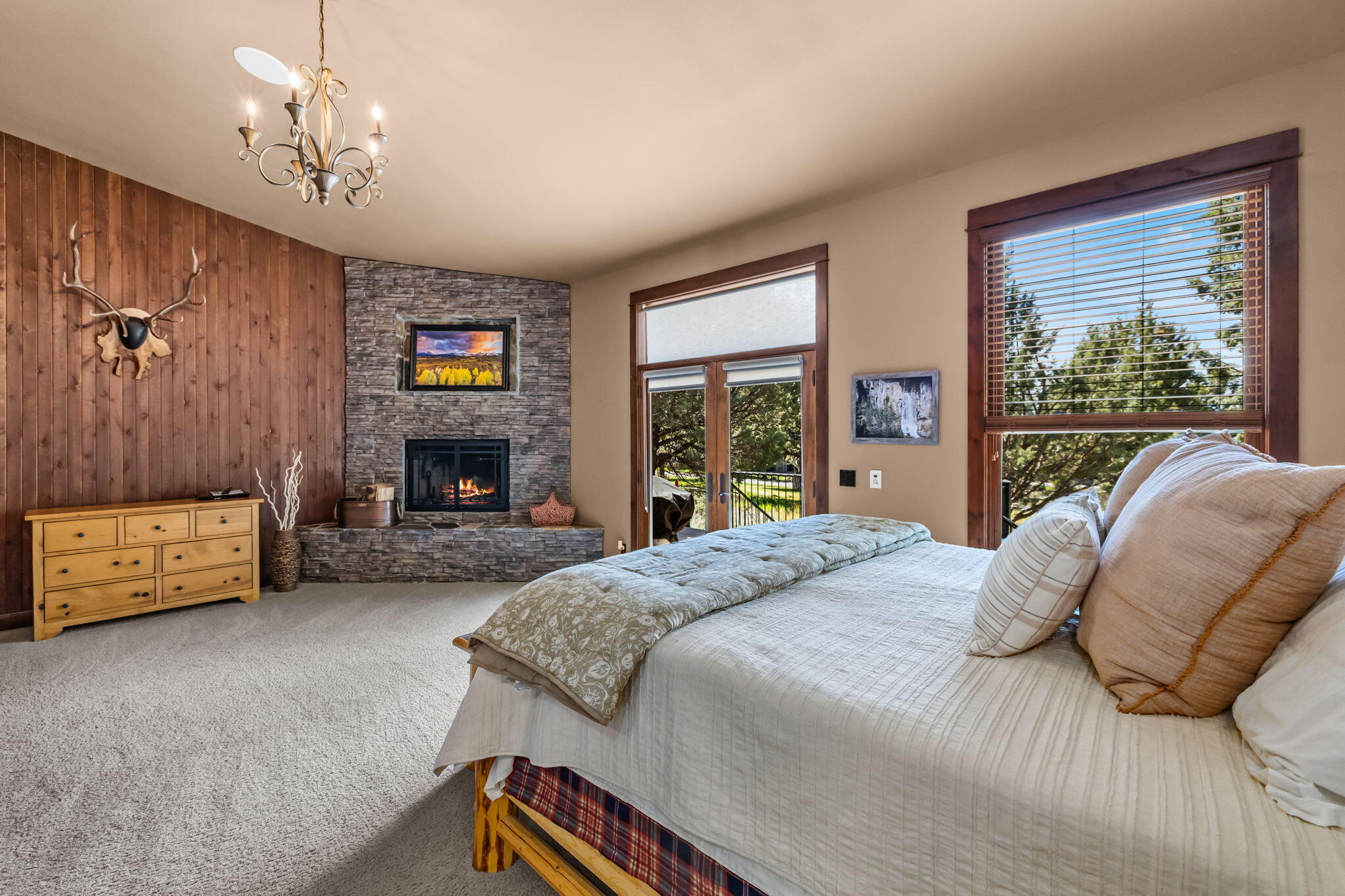 1144 Highland View Loop Redmond, OR 97756 - Photo 22 of 69 a bedroom with a bed and a couch