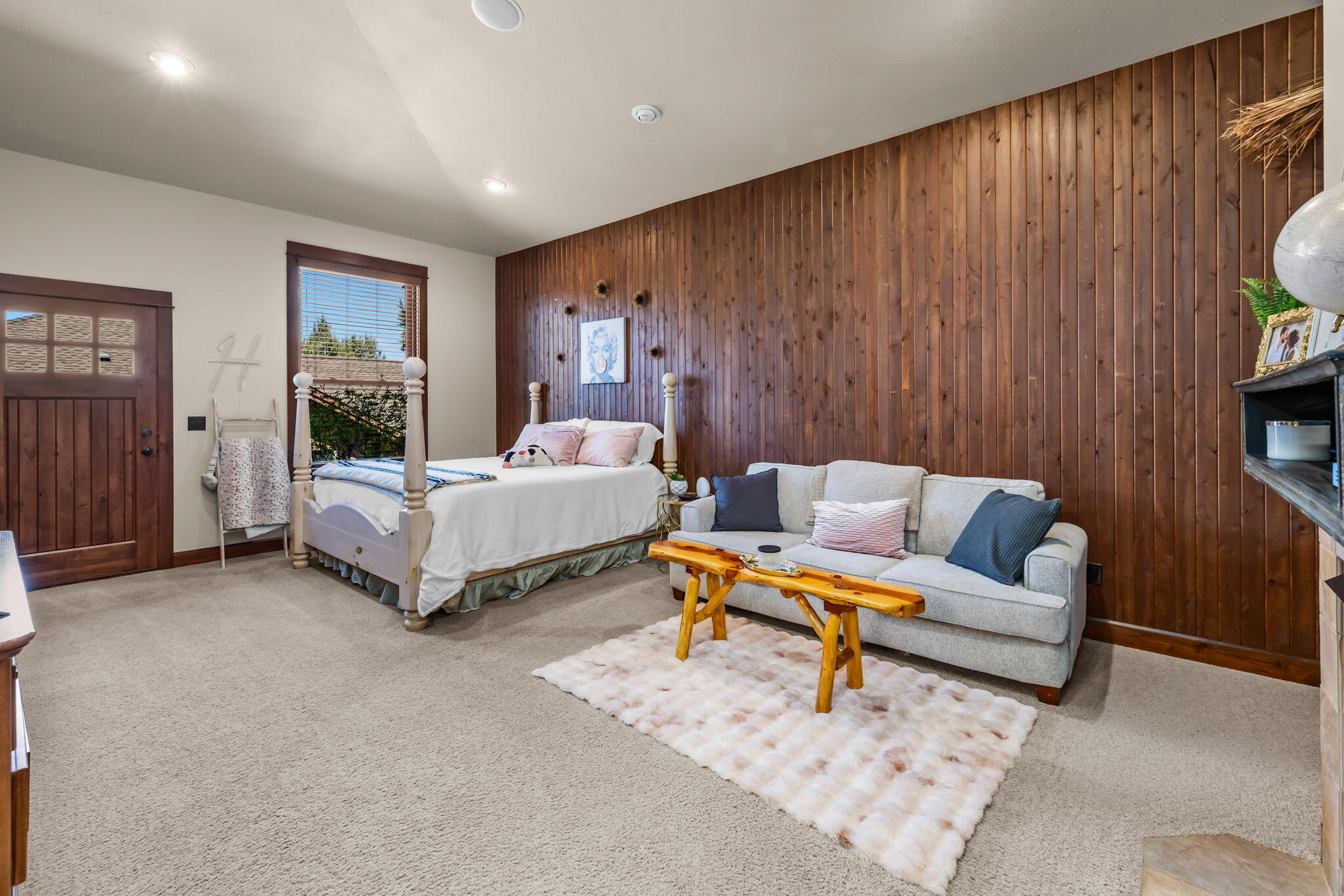 1144 Highland View Loop Redmond, OR 97756 - Photo 26 of 69 a bedroom with a bed and a couch