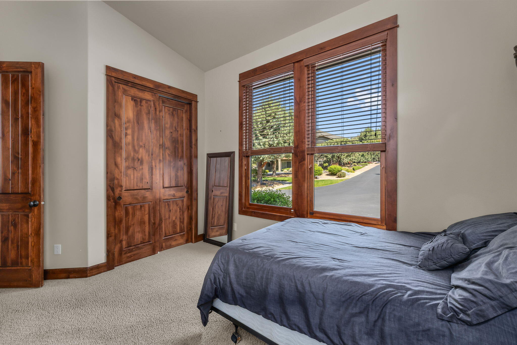 1144 Highland View Loop Redmond, OR 97756 - Photo 31 of 69 a bedroom with a bed and a window