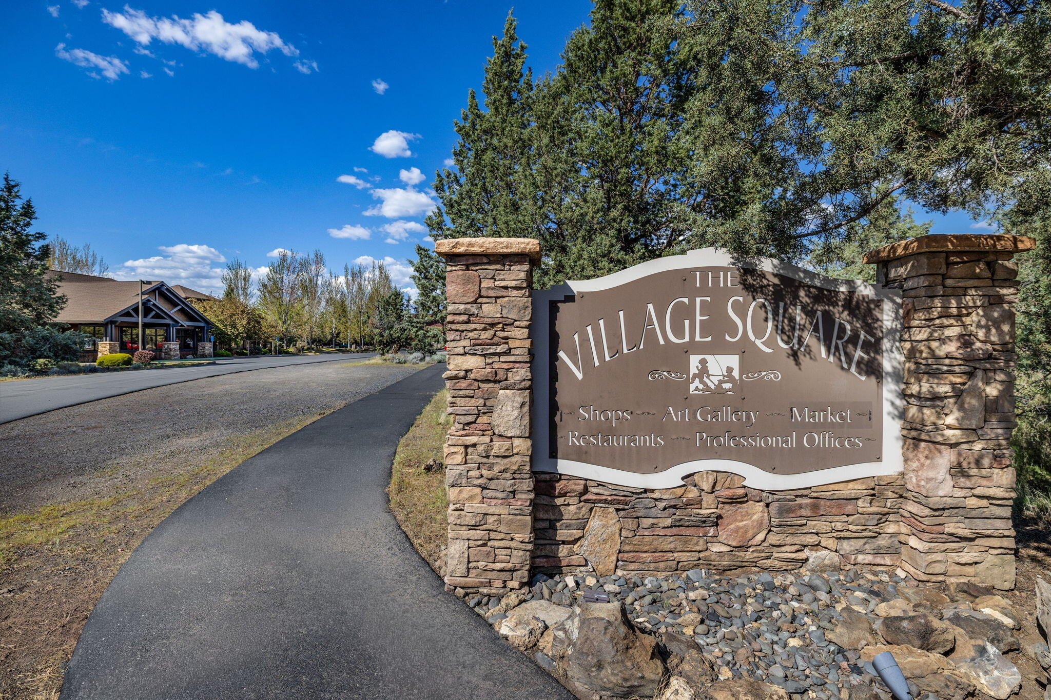 1144 Highland View Loop Redmond, OR 97756 - Photo 61 of 69 a view of a street with a building in the background