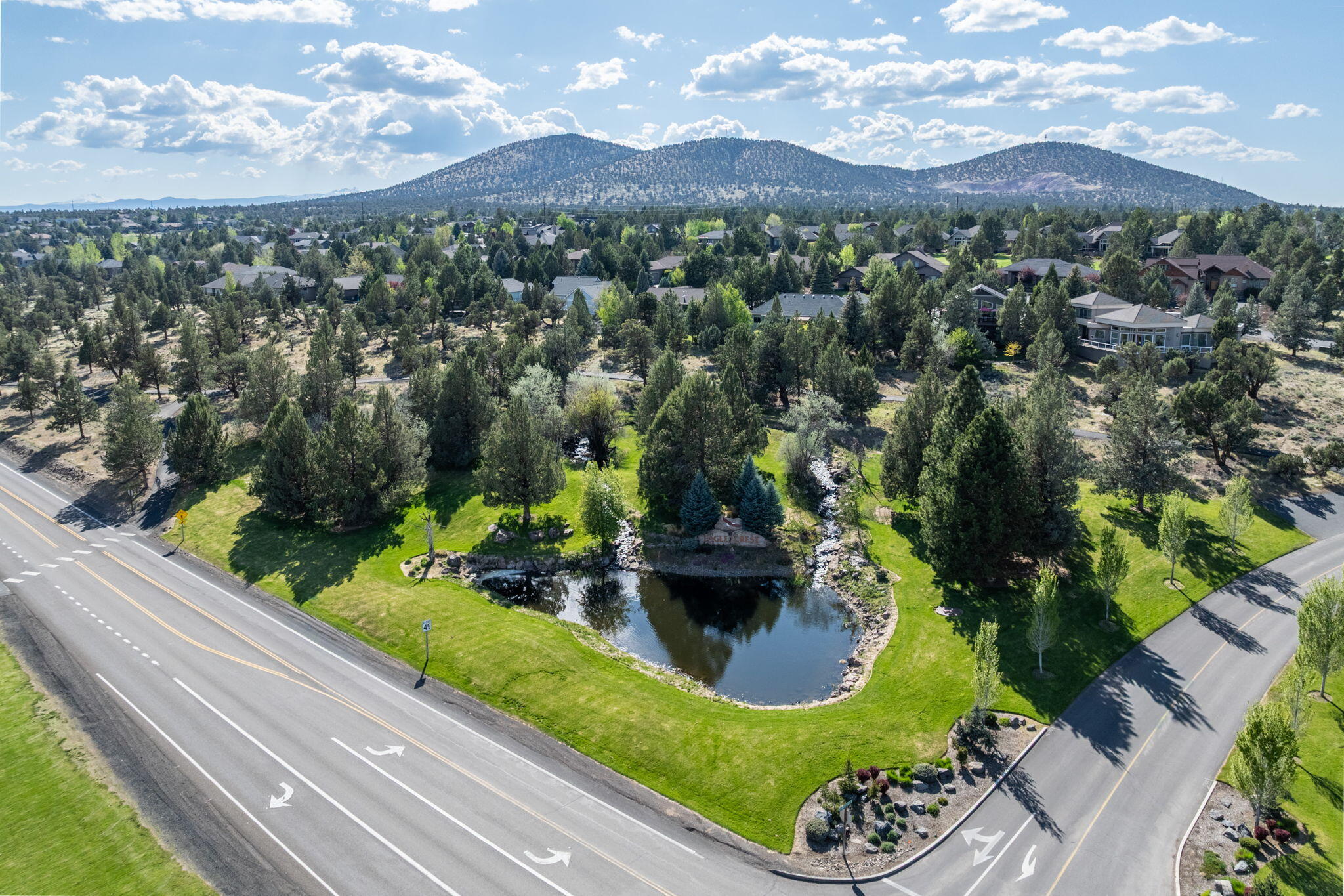 1144 Highland View Loop Redmond, OR 97756 - Photo 64 of 69 an aerial view of a house with a yard and lake view