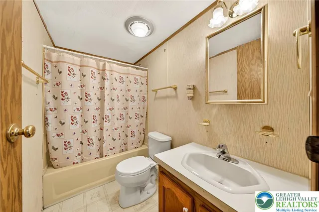 a view of a livingroom with a flat screen tv