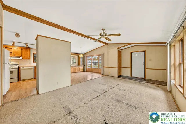 a view of an empty room and window