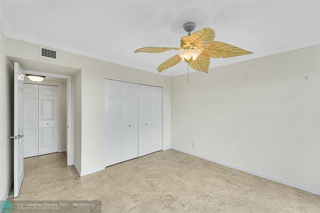 10777 West Sample Road, Unit 805 Coral Springs, FL 33065 - Photo 12 of 34 a view of small space with a fan
