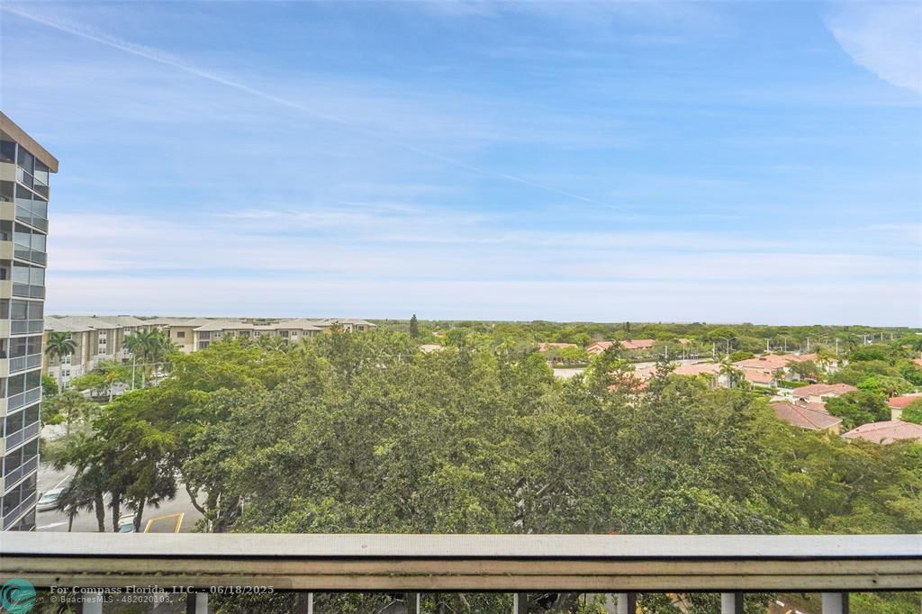 10777 West Sample Road, Unit 805 Coral Springs, FL 33065 - Photo 28 of 34 a view of a city and an ocean