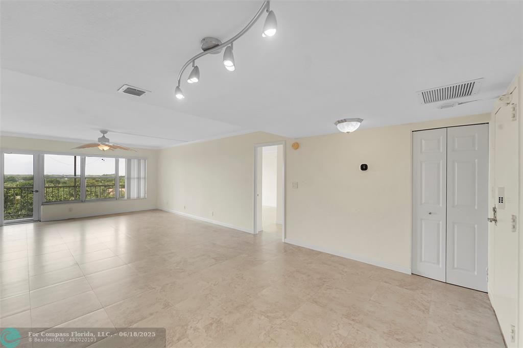 10777 West Sample Road, Unit 805 Coral Springs, FL 33065 - Photo 29 of 34 an empty room with windows and view