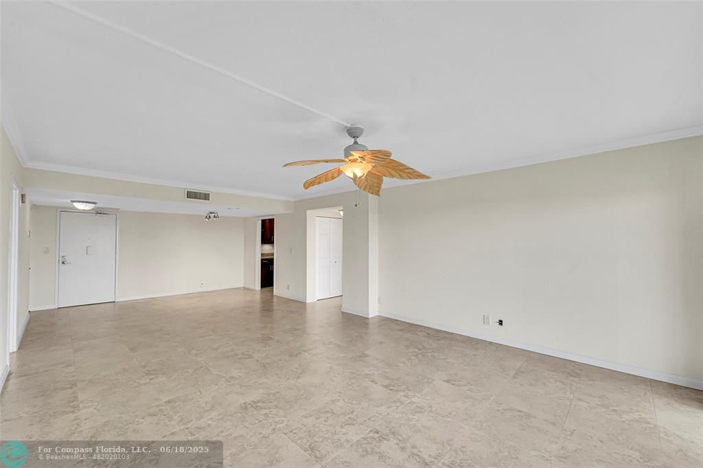 10777 West Sample Road, Unit 805 Coral Springs, FL 33065 - Photo 3 of 34 wooden floor in an empty room