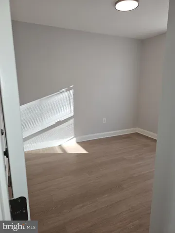 a kitchen with stainless steel appliances a stove a microwave and cabinets
