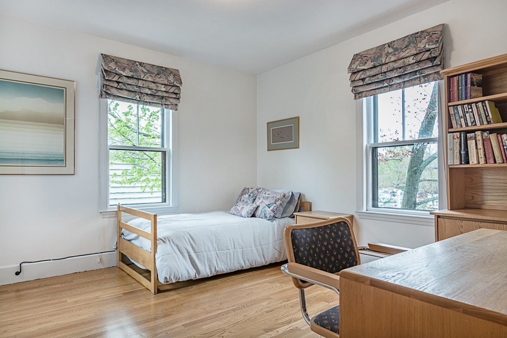 7 Raymond Street Lexington, MA 02421 - Photo 12 of 22 a bedroom with a bed and a window