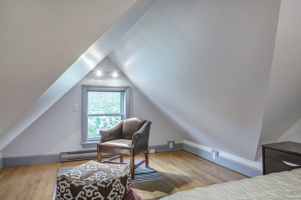 7 Raymond Street Lexington, MA 02421 - Photo 17 of 22 a living room with furniture and a window