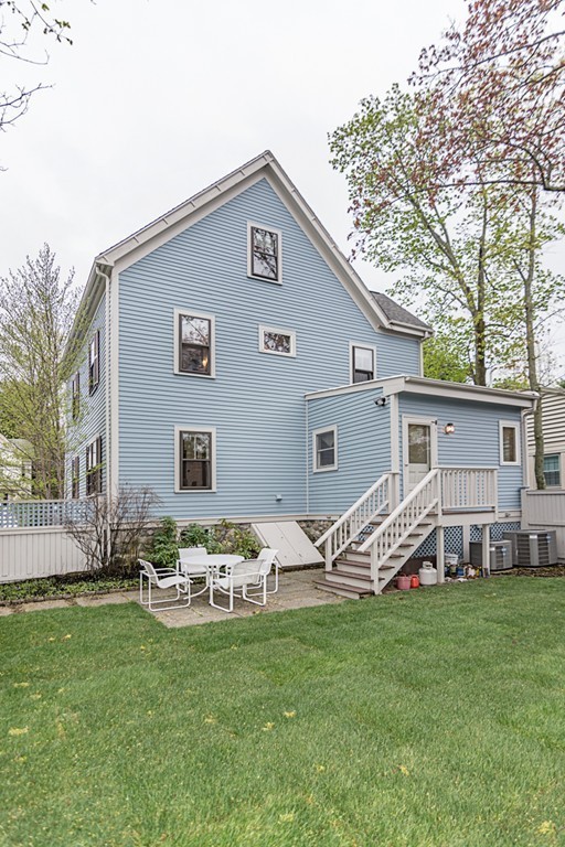 7 Raymond Street Lexington, MA 02421 - Photo 21 of 22 a front view of house with yard and outdoor seating