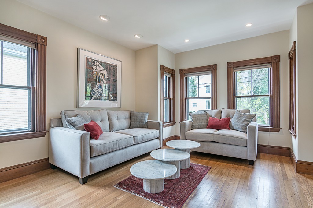 7 Raymond Street Lexington, MA 02421 - Photo 3 of 22 a living room with furniture and a window
