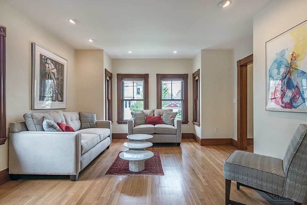 7 Raymond Street Lexington, MA 02421 - Photo 4 of 22 a living room with furniture and a wooden floor
