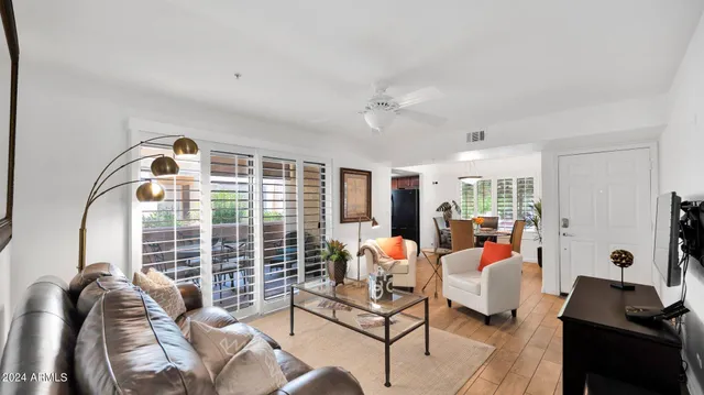 a bed room with furniture and a window