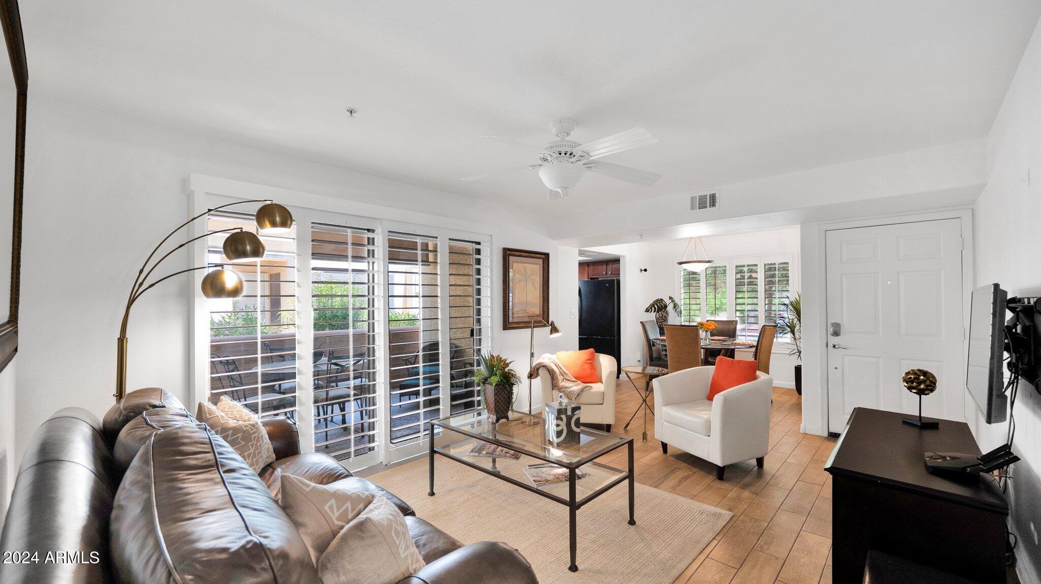 a bed room with furniture and a window