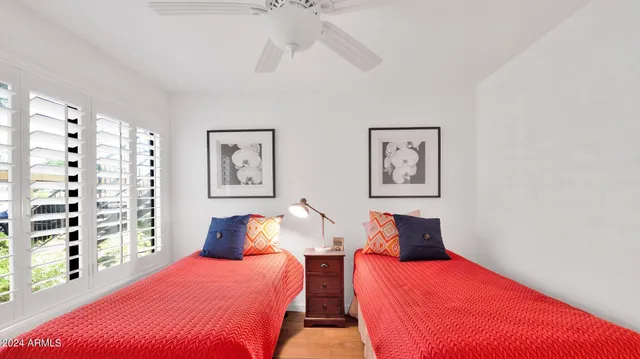 a bedroom with a bed and a walk in closet