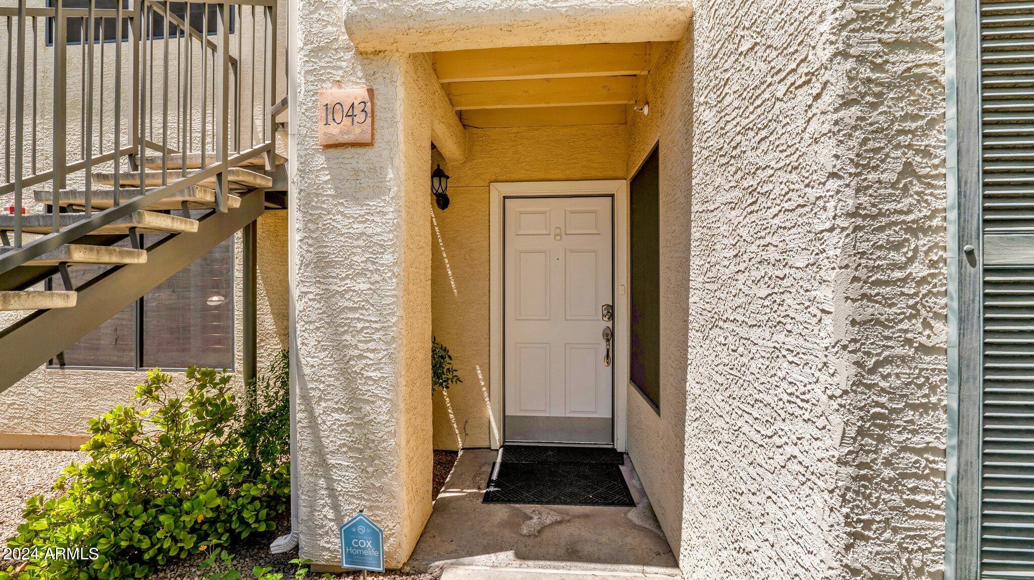 9990 North Scottsdale Road, Unit 1043 Paradise Valley, AZ 85253 - Photo 3 of 28 view of the door of the house