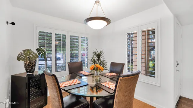 a view of a dining room with furniture window and outside view