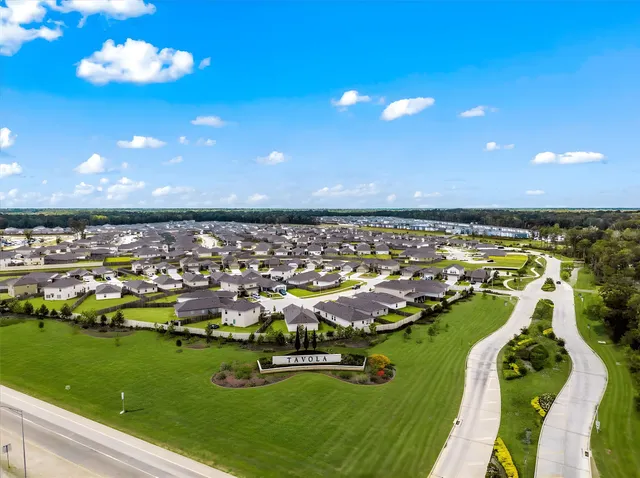 a view of a garden with an ocean view