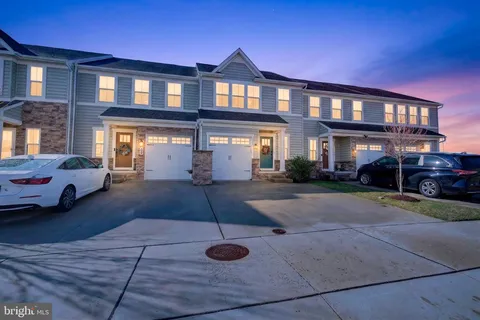 a front view of a house with entertaining space